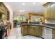 Gourmet kitchen with stainless steel appliances and granite countertops at 4925 Pageland Hwy, Monroe, NC 28112
