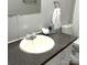 Bathroom with white vanity and large mirror with white fixtures at 5767 Swinging Bridge Rd, Conover, NC 28613