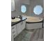 Bathroom boasts a corner tub, vanity, and modern fixtures at 5767 Swinging Bridge Rd, Conover, NC 28613