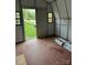 Bright, open shed interior with an open door, ample space, and natural light for various activities at 5767 Swinging Bridge Rd, Conover, NC 28613