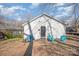 Rear view of home with chairs and yard at 705 Sumter St, Lancaster, SC 29720