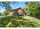 This large yard includes a brick home with a deck and plenty of lawn at 73 Wyth Sw Ct, Concord, NC 28025