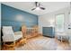 Charming bedroom with neutral paint, hardwood floors, accent wall, and lots of natural light at 73 Wyth Sw Ct, Concord, NC 28025