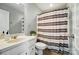Bathroom featuring a vanity, toilet, mirror, and a shower with a striped curtain at 8504 Sunset Hill Rd, Waxhaw, NC 28173