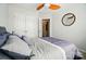Neutral bedroom featuring a ceiling fan, closet and an open doorway at 8504 Sunset Hill Rd, Waxhaw, NC 28173