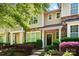 Charming townhome with stone accents, manicured landscaping, and a welcoming front entrance at 8504 Sunset Hill Rd, Waxhaw, NC 28173