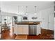 Bright kitchen with an island and stainless steel appliances at 8504 Sunset Hill Rd, Waxhaw, NC 28173