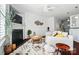 Bright living room featuring a fireplace, stylish decor, and comfortable seating arrangement at 8504 Sunset Hill Rd, Waxhaw, NC 28173