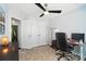 Home office featuring a work station, storage cabinet, and double door closet at 8504 Sunset Hill Rd, Waxhaw, NC 28173