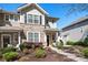 Inviting home exterior showcasing manicured landscaping and a stone facade at 8524 Sunset Hill Rd, Waxhaw, NC 28173