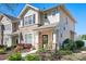 Charming home with stone accents, black shutters, and a beautifully landscaped front yard at 8524 Sunset Hill Rd, Waxhaw, NC 28173