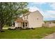Well-maintained home with a lush green lawn and mature trees, offering great curb appeal at 8604 Cedardale Ridge Ct, Charlotte, NC 28269