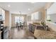 Bright eat-in kitchen featuring a window and modern stainless-steel appliances at 8604 Cedardale Ridge Ct, Charlotte, NC 28269