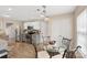 Charming kitchen with stainless appliances, a glass breakfast table, and easy access to storage at 8604 Cedardale Ridge Ct, Charlotte, NC 28269