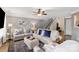 Relaxing living room with plush seating, decor, and staircase leading to the upper level at 8604 Cedardale Ridge Ct, Charlotte, NC 28269