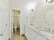 Bathroom with double sinks, granite countertop vanity, and a toilet/shower room at 915 Gate Rd, Monroe, NC 28112