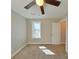 Bright bedroom with a window and ceiling fan, providing a comfortable and relaxing space at 932 3Rd Street Sw Pl, Hickory, NC 28602