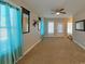Inviting living room with neutral tones, ceiling fan, and natural light, ideal for entertaining guests at 932 3Rd Street Sw Pl, Hickory, NC 28602