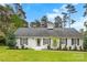 Charming one-story home with a lush green lawn and manicured landscaping at 103 Colonel Richard Rankin Dr, Stanley, NC 28164
