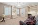 Bedroom with built-in desk and storage, and comfortable seating at 10609 Oak Pond Cir, Charlotte, NC 28277