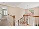 Entryway with staircase, chandelier, and a view to the front door, creating an inviting first impression at 10609 Oak Pond Cir, Charlotte, NC 28277