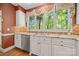 Kitchen featuring a sink beneath a large window and granite countertops at 10609 Oak Pond Cir, Charlotte, NC 28277