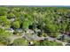 Aerial view of a property highlighting the lot lines with surrounding lush greenery and neighborhood streets at 1068 14Th Nw Ave, Hickory, NC 28601