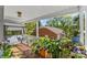 Charming porch with a swing, plants, and views of the surrounding yard and neighborhood at 1068 14Th Nw Ave, Hickory, NC 28601