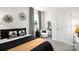 Elegant bedroom featuring a modern chair, sleek black accents, and neutral decor at 121 Falling Up Ln, Salisbury, NC 28147