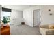 Bright hallway area with neutral tones, carpeted floor, and modern decor with easy access to the rooms around it at 121 Falling Up Ln, Salisbury, NC 28147