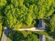 Aerial shot of the home and neighborhood, showing lush greenery at 1277 Rainbow Cir, Catawba, SC 29704