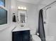 Cozy bathroom featuring a modern vanity, subway tile shower, and efficient use of space at 1277 Rainbow Cir, Catawba, SC 29704