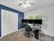 Spacious bedroom set up with multiple monitors, perfect for a home office or gaming setup at 1277 Rainbow Cir, Catawba, SC 29704