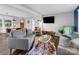 Comfortable living area with a large sofa, modern decor, and hardwood floors for a stylish look at 1277 Rainbow Cir, Catawba, SC 29704