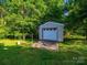 Storage shed featuring a concrete driveway at 1277 Rainbow Cir, Catawba, SC 29704