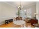 Elegant dining room with hardwood floors, plantation shutters, and stylish furnishings, perfect for entertaining at 1317 Waynewood Dr, Waxhaw, NC 28173