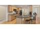 Beautiful kitchen features stainless appliances, granite counters, and island seating at 1317 Waynewood Dr, Waxhaw, NC 28173