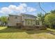 Large backyard with patio, deck, and lots of green space at 13843 Poppleton Ct, Charlotte, NC 28273