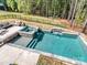 Aerial view of a backyard swimming pool and patio area at 143 Robinson Ridge Dr, Mooresville, NC 28117
