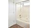 Bathroom features a shower and tub combination and updated fixtures at 14608 Arlandes Dr, Charlotte, NC 28278