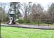 Enjoy the community playground with swings and slide on a sunny afternoon at 14608 Arlandes Dr, Charlotte, NC 28278