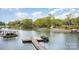 Lakefront property featuring a private wooden dock, perfect for boating and enjoying waterfront living at 147 Spring Shore Rd, Statesville, NC 28677