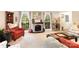 Inviting living room featuring a stone fireplace, ample seating, and cozy decor at 147 Spring Shore Rd, Statesville, NC 28677