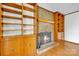 Cozy living room with wood burning fireplace and beautiful built-ins at 165 Northwest Rd, Hickory, NC 28601