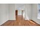 Open-concept living space with hardwood floors and neutral wall paint at 165 Northwest Rd, Hickory, NC 28601