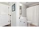 Cozy bathroom featuring a stylish vanity, mirror, and shower with a pristine white curtain at 1813 Wedowee Ct, Rock Hill, SC 29732