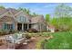 Beautifully landscaped front yard featuring a comfortable bench and colorful flowerbeds at 1813 Wedowee Ct, Rock Hill, SC 29732