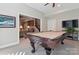 Entertainment-ready game room with a pool table and wet bar area for leisure and fun at 1813 Wedowee Ct, Rock Hill, SC 29732