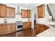 Gourmet kitchen featuring granite countertops, stainless steel appliances, and custom cabinetry at 1813 Wedowee Ct, Rock Hill, SC 29732
