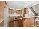 Well-equipped kitchen with stainless steel appliances, granite countertops, and wooden cabinetry at 1813 Wedowee Ct, Rock Hill, SC 29732